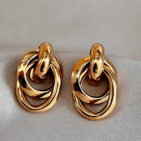 Серьги крупные кольца узелки золотистые old money 2026. 404 Style