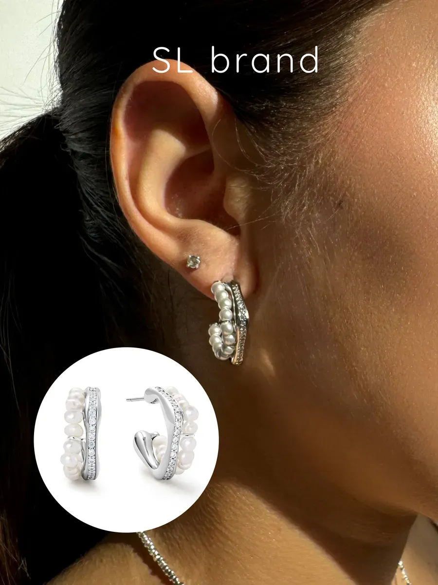 Серьги с жемчужной вставкой стальные с изгибом. SL