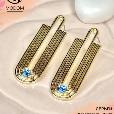 Вечерние стильные серьги дорожки с голубым камнем. MODOM