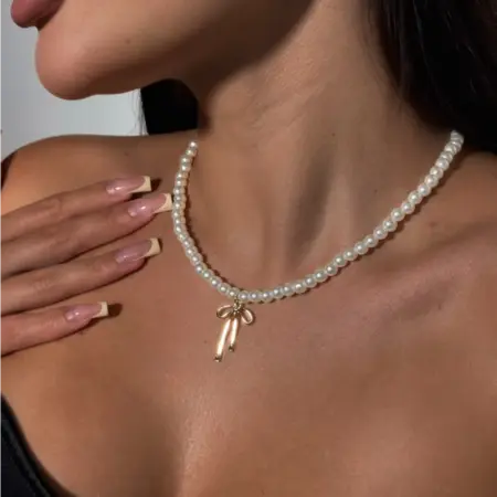 Колье из жемчуга с кулоном. Штучка